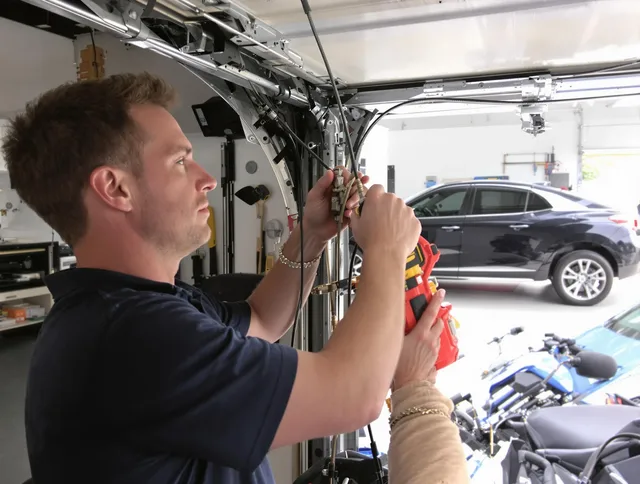 Jerome Garage Door Repair safety certified technician performing cable replacement in Jerome